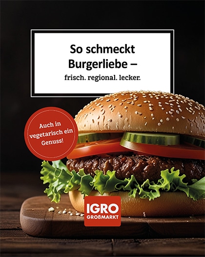 Eine Nahaufnahme eines großen, appetitlichen Burgers auf einem rustikalen Holzbrett, mit Sesamsamen-Brötchen, fleischartigem Patty, Salat, Tomaten und Gurken. Der dunkle Hintergrund ist unscharf. Oben, in einem weißen, umrandeten Kasten, steht der Text: "So schmeckt Burgerliebe – frisch. regional. lecker." Links befindet sich ein roter Kreis mit dem Text: "Auch in vegetarisch ein Genuss!". Unten in der Mitte ist das IGRO Großmarkt Logo zu sehen.
